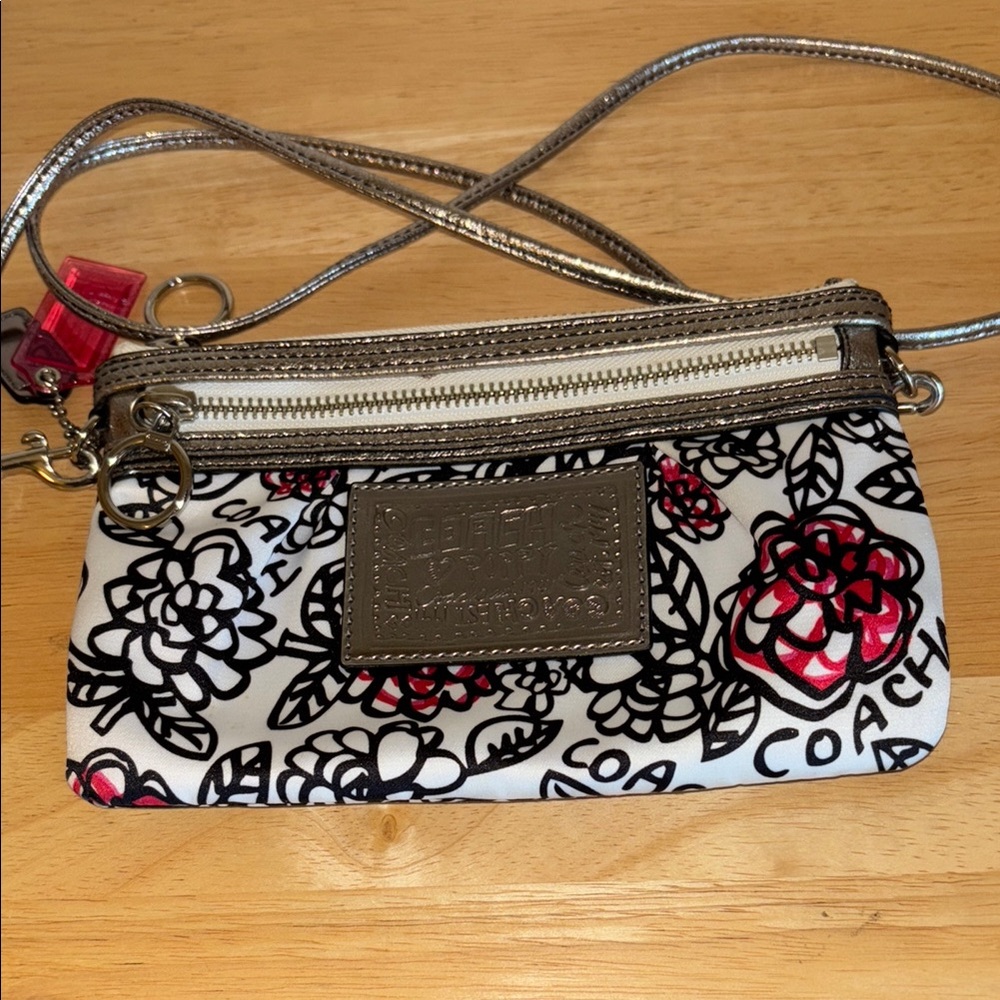 Coach Black and White Clutch with Floral Accents
